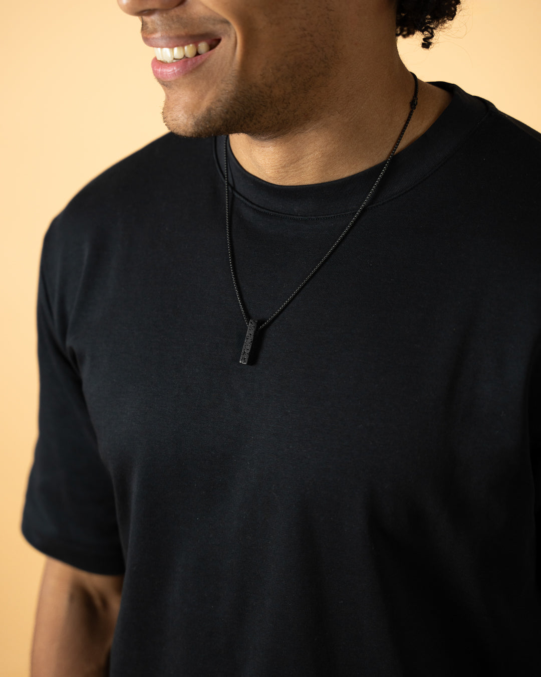 Stainless steel necklace with a Black Lava stone, Gemini