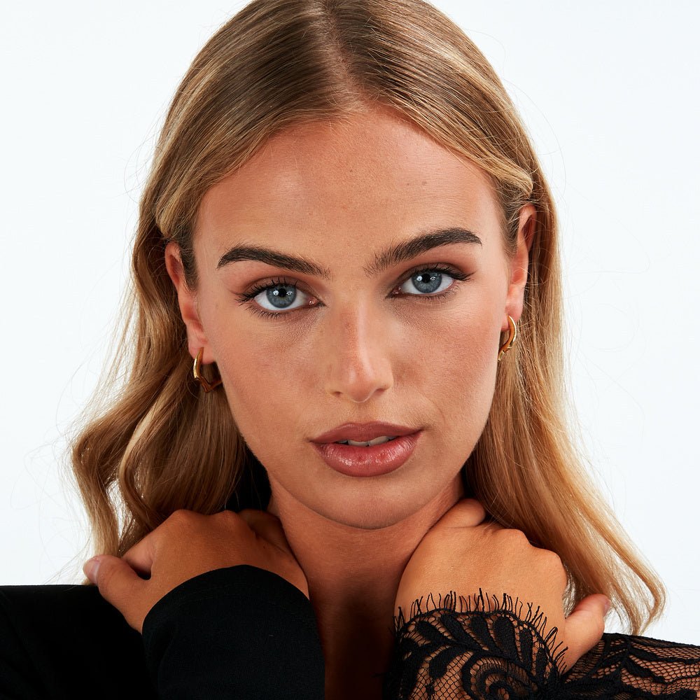 Cercei cu forma neregulata T - Design - Cercei cu surub - tjaxa05 - TRUSSARDI - Tessora